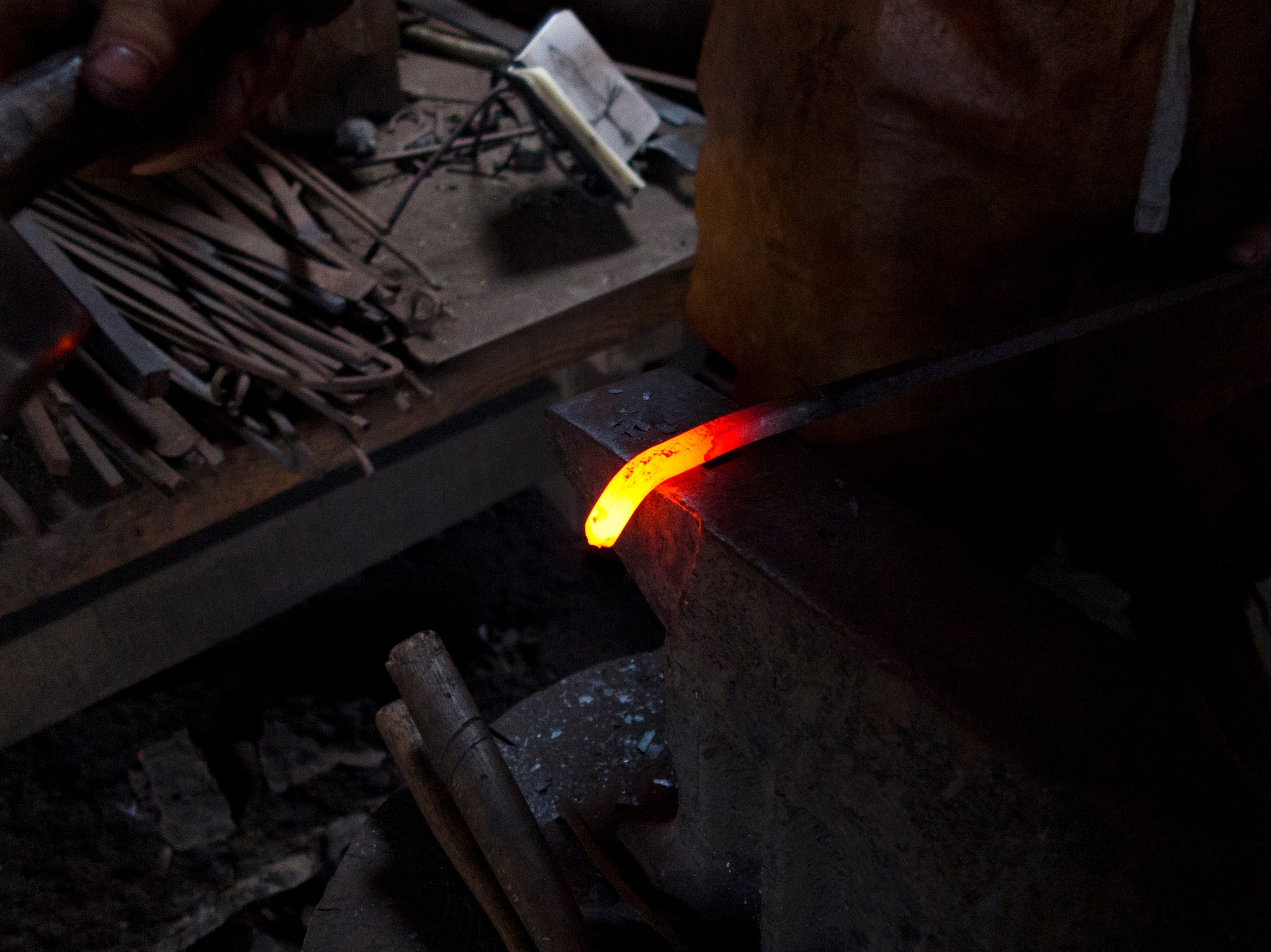 Hammer an angle to the rod to hold the rope from slipping